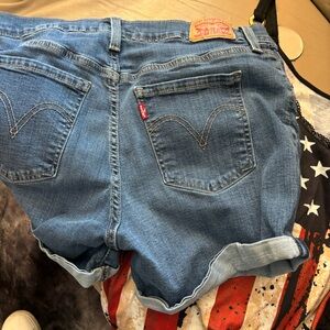 Lot of Levis and summer tops. Red, white and blue not included